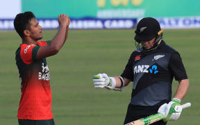 Mohammad Saifuddin celebrates the wicket of Tom Latham. 2021.