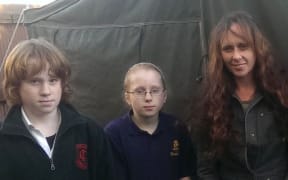 Katrina Collins with Fenris, 11 (left) and nine-year-old Kaia.