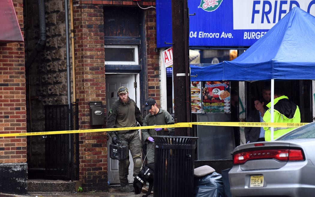 FBI officers searched the family restaurant and apartment of Ahmad Khan Rahami in Elizabeth, New Jersey, on 19 September 2016. .