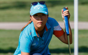 Lydia Ko lines up a putt, Texas, 2015.
