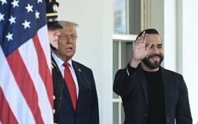 US President Donald Trump welcomes El Salvador's President Nayib Bukele upon arrival at the White House in Washington, DC, April 14, 2025. (Photo by Brendan SMIALOWSKI / AFP)