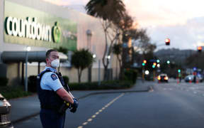 AUCKLAND, NEW ZEALAND - SEPTEMBER 03: Police guard the area around Countdown LynnMall after a violent extremist took out a terrorist attack stabbing six people before being shot by police on September 03, 2021 in Auckland,