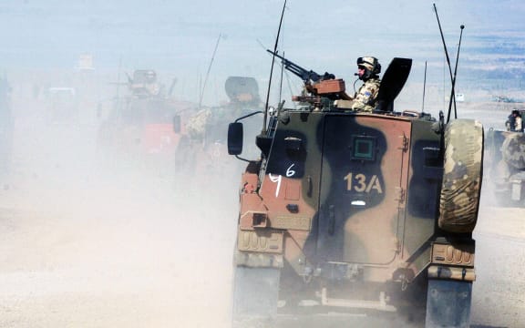 Australian soldiers of the NATO-led International Security Assistance Force (ISAF) patrol in Tirin Kot, the capital of Uruzgan province in Afghanistan on 17 February 2007.