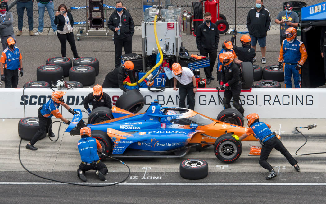 Scott Dixon, Chip Ganassi Racing Honda pit stop practice.