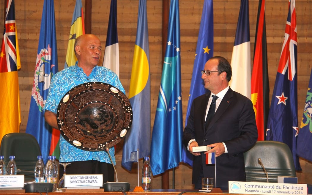 Colin Tukuitoga with the French president Francois Hollande in Noumea