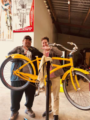 Teau Aiturau and Wallace at the Mangere workshop where he fixes donated bikes and gives them away