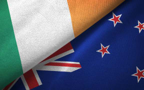 Ireland and New Zealand flags together textile cloth, fabric texture