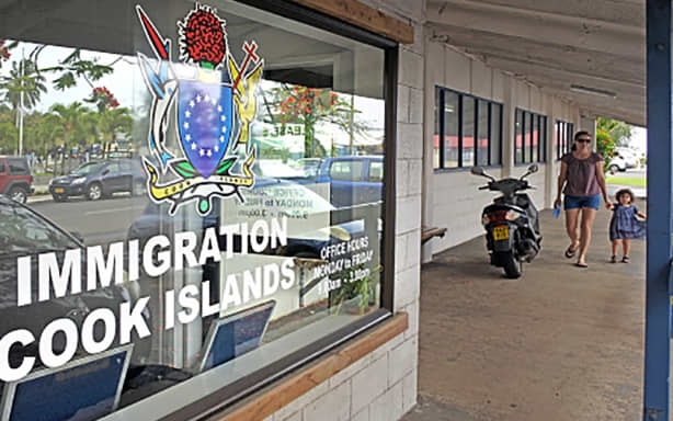 Woman and child walk past the Cook Islands Immigration office in Avarua. Subchiefs in the Cook Islands are calling for the government to tighten immigration and permanent residency rules.