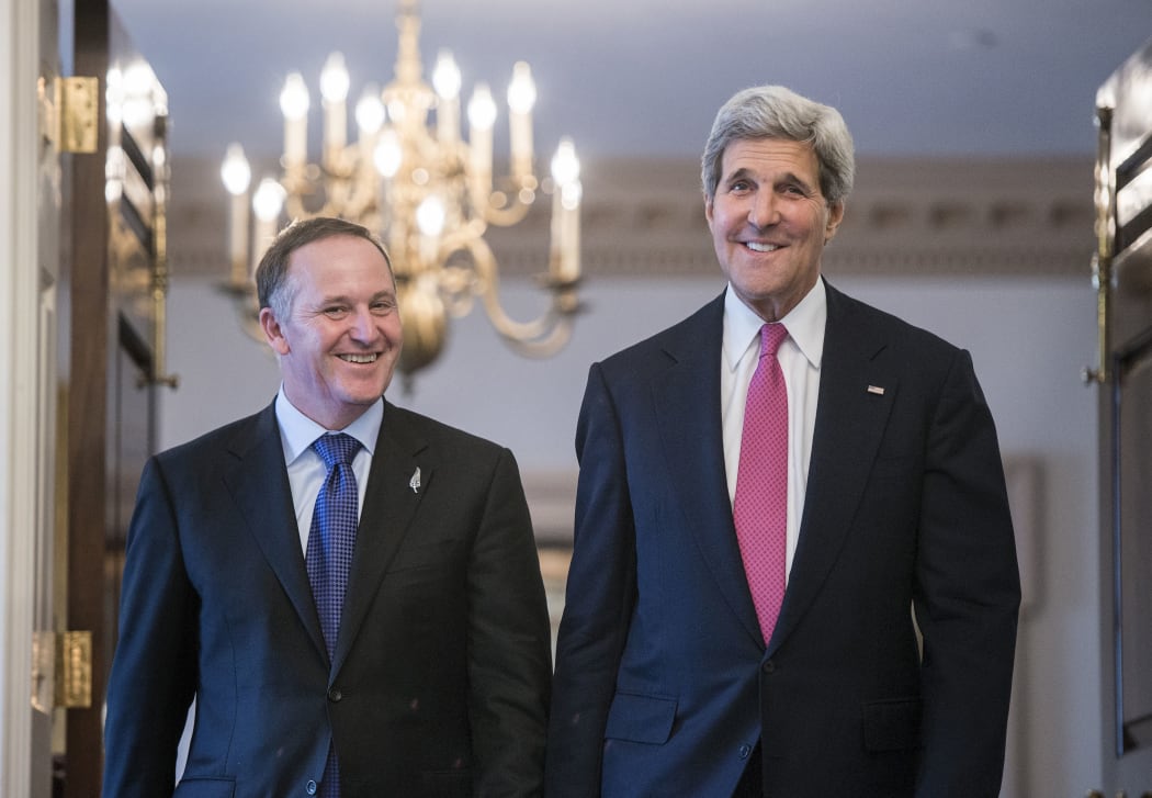 John KeyJohn Kerry walk to a media briefing in Washington.