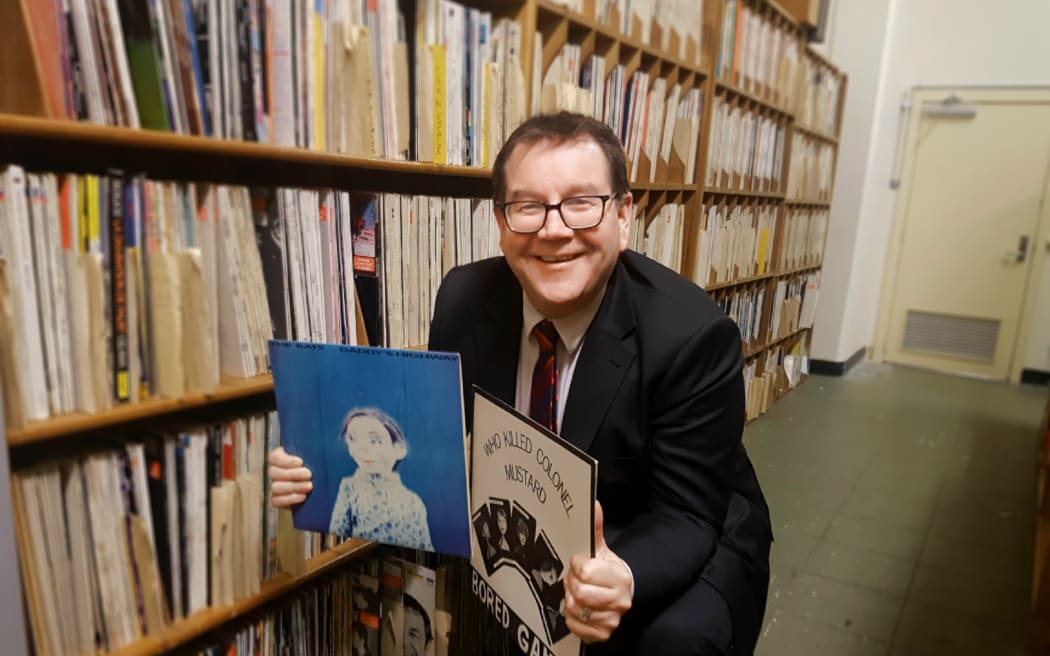 Minister of Finance and Flying Nun fanboy Grant Robertson amongst the RNZ local vinyl archive