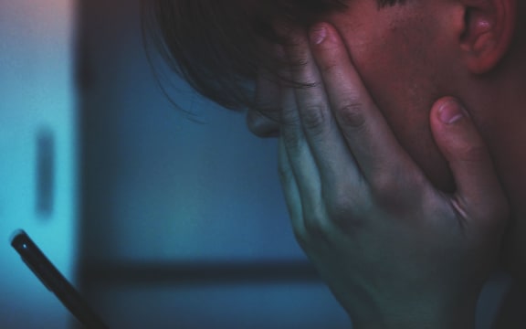Teenage boy on cell phone