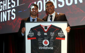 Shaun Johnson and Stephen Kearney celebrate a milestone for the star playmaker.