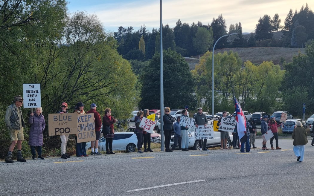 The protest moved to line the road entering the Shotover Wastewater Treatment Plant.