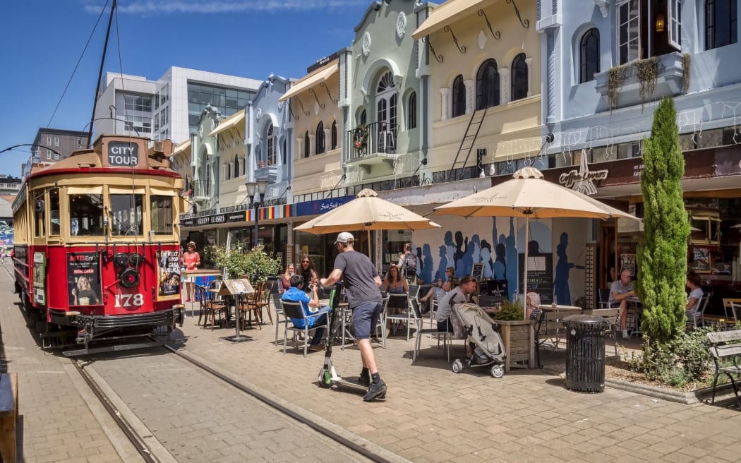 3 January 2019: Christchurch, New Zealand - New Regent Street in the centre of Christchurch, with outdoor cafes and speciality shops, and the tram route running through it.