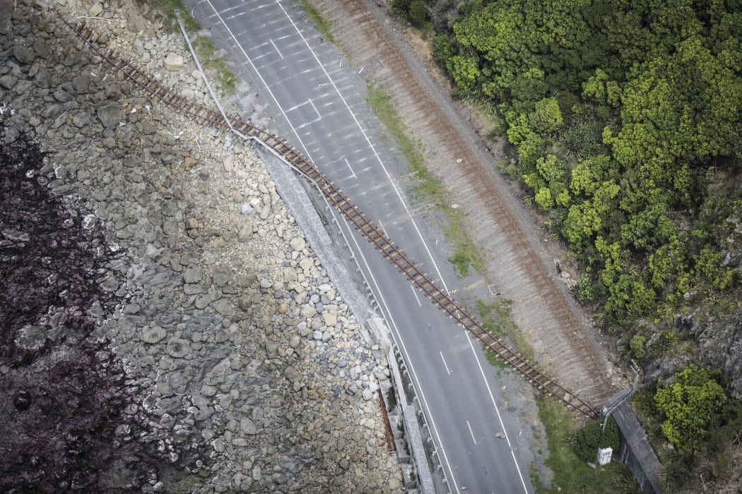 Coastal Road to Kaikoura - rail road cuts through state highway 1