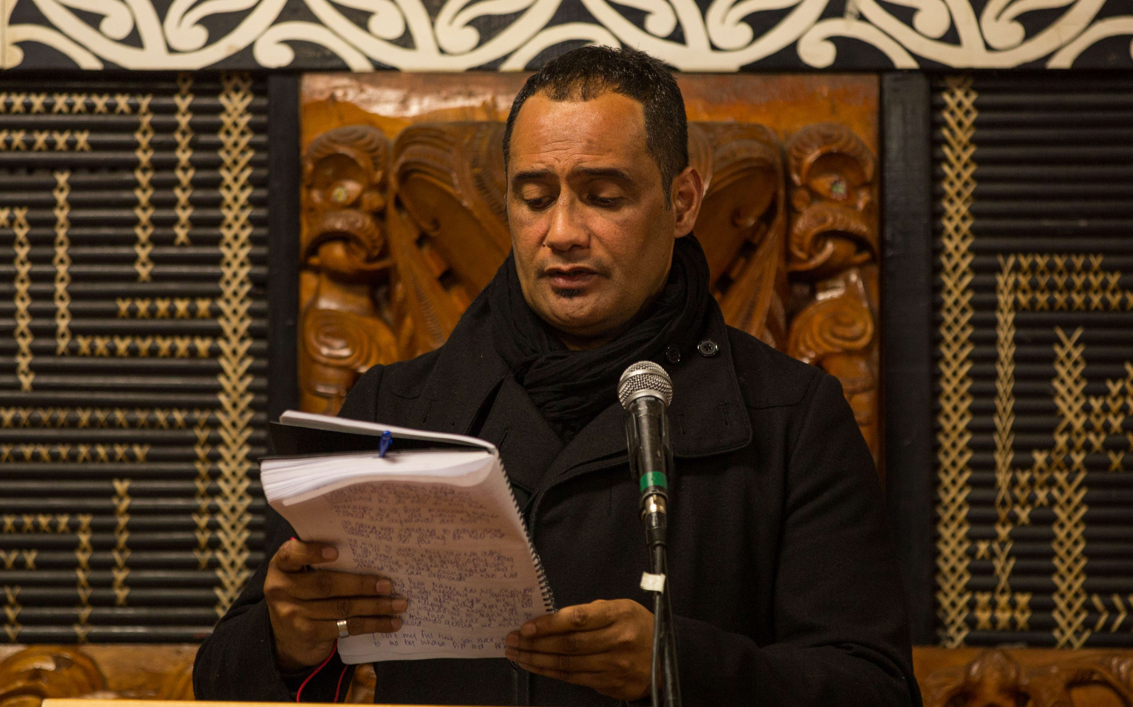 Hurimoana Dennis reads out letters from grateful people who received help from Te Puea Marae. 31 August 2016.
