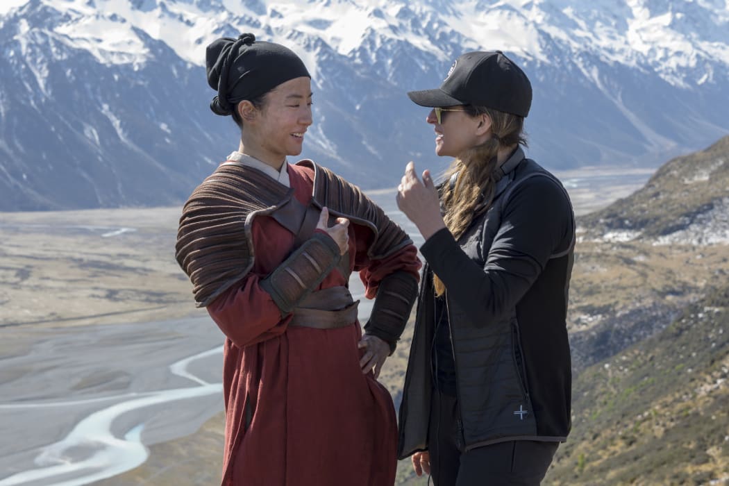 Niki Caro (right) on the set of Mulan