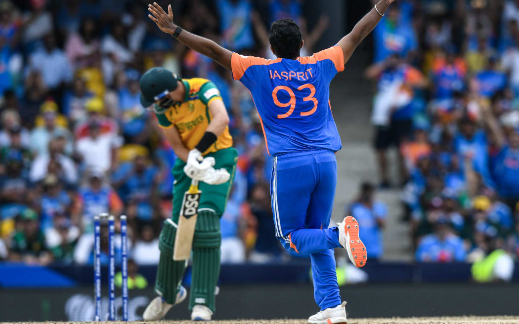 India's Jasprit Bumrah celebrates dismissing South Africa's Marco Jansen.