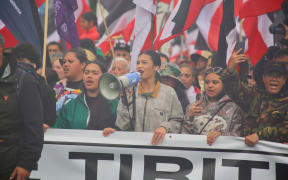 Te Koha o Te Moana Shortland leads a chant at the front of the hīkoi in Rotorua.