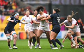 England centre Tatyana Heard takes on Scotland's defenders in their World Cup quarter-final.