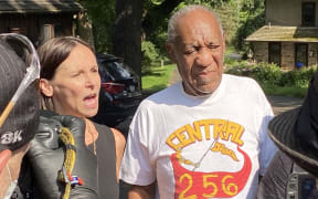 Bill Cosby with attorney Jennifer Bonjean outside the actor's home in Pennsylvania after he was released from prison on 30 June 2021.