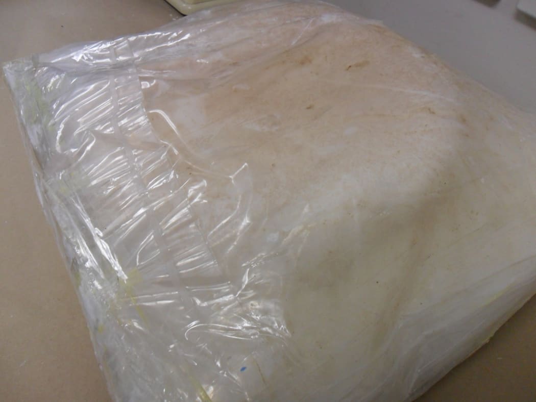 A 10kg package of meth that was concealed in one of the suitcases.