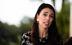 Prime Minister Jacinda Ardern speaks to media after a worker at Auckland Airport tested positive for Covid-19.