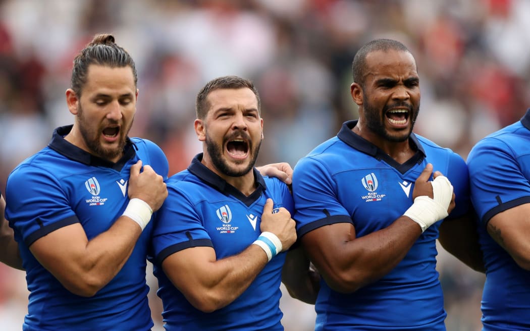Italy's players put there hearts into a powerful rendition of the national anthem.