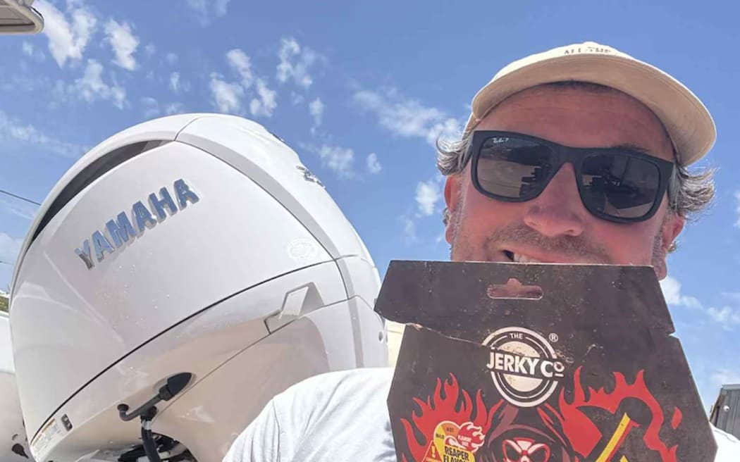 Quoin Sellenger with the recovered goods, which appear to have expired in 2022.