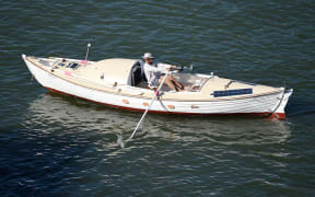Tom Robinson is rowing across the Pacific in a seven-metre boat he designed and built himself