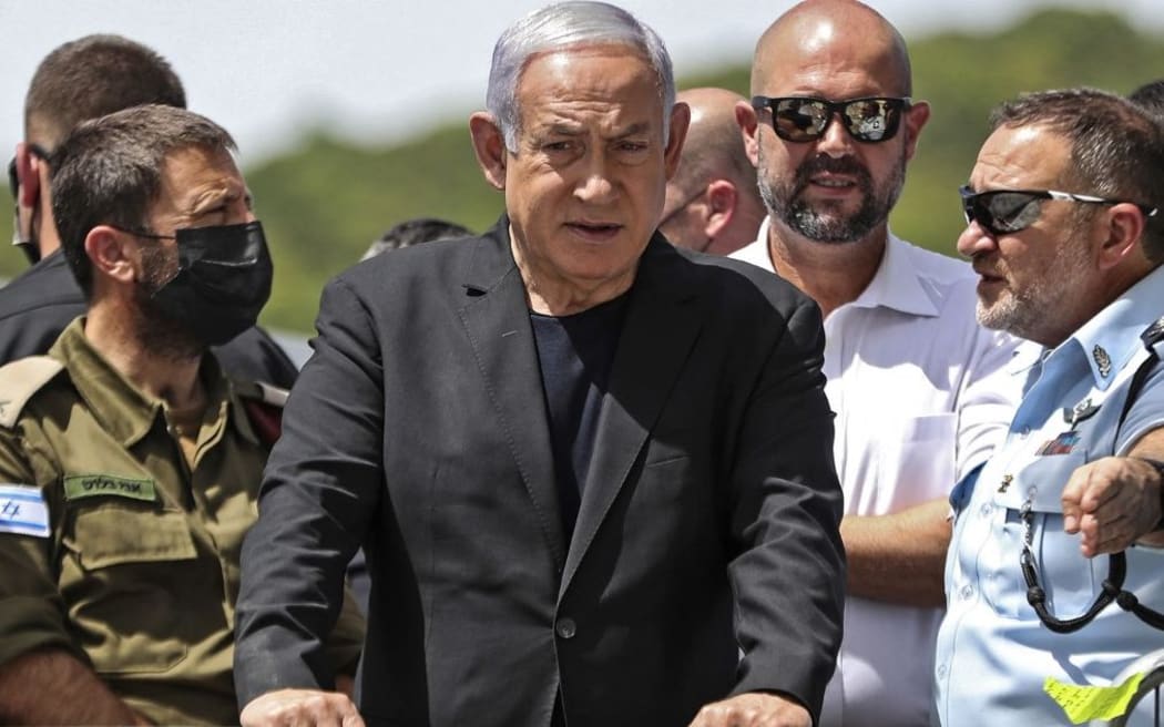 Israeli Prime Minister Benjamin Netanyahu visits the site of an overnight stampede during an ultra-Orthodox religious gathering in the northern Israeli town of Meron, on April 30, 2021.