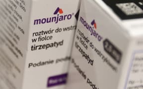 Mounjaro manufactured by Eli Lilly and Company packaging is seen in this illustration photo taken in a pharmacy in Krakow, Poland on April 9, 2024. (Photo by Jakub Porzycki/NurPhoto) (Photo by Jakub Porzycki / NurPhoto / NurPhoto via AFP)