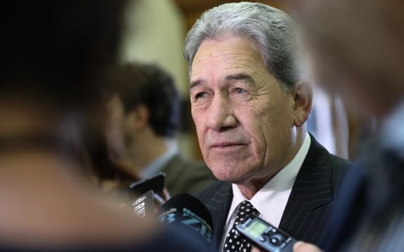 Winston Peters speaks to the media as acting Prime Minister