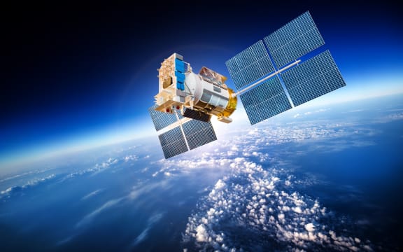 Space satellite orbiting the earth.