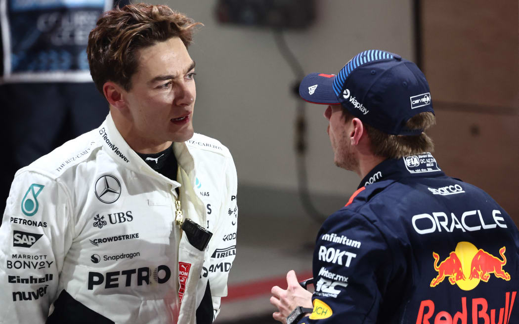 George Russell of Mercedes and Max Verstappen of Red Bull