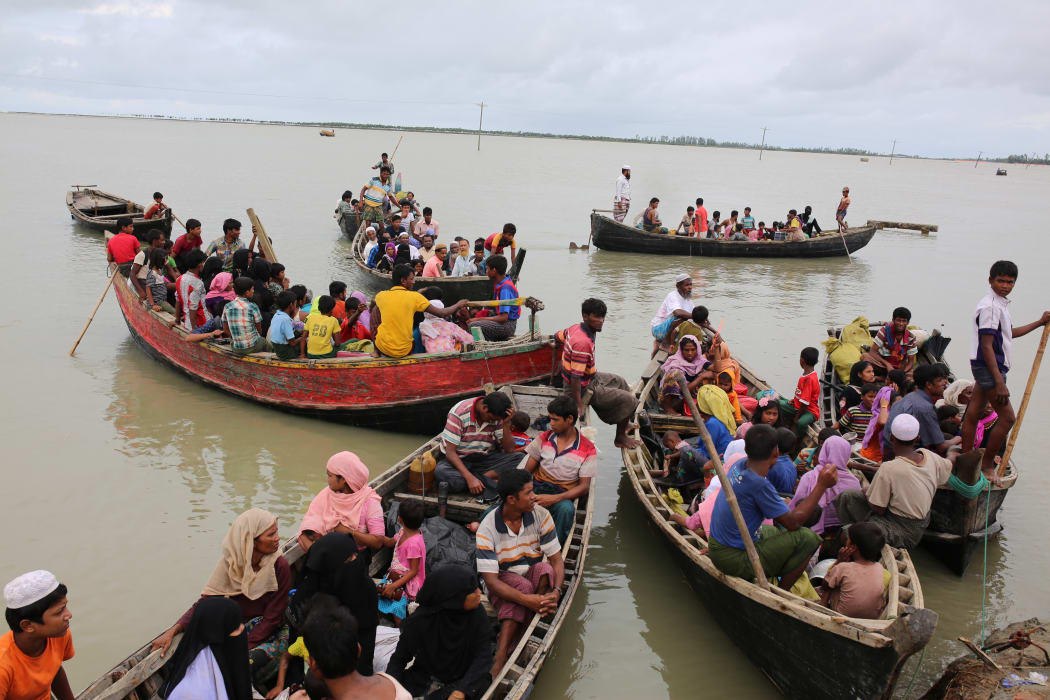 Rohingya people, fled from ongoing military operation in Myanmar Rakhain state, ride on boat at Shah Pori Island to go to refugee camp in Shah Pori Island in Bangladesh on October 07, 2017.
Rohinngya people fled continuing in Bangladesh.