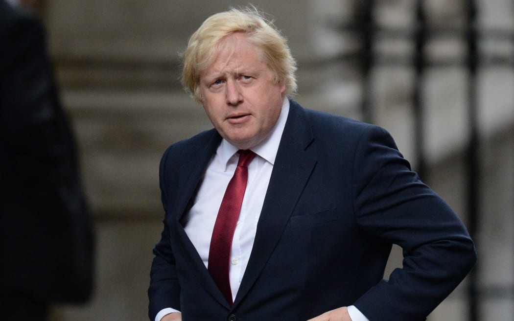 Former mayor of London Boris Johnson walks to 10 Downing Street in central London on July 13, 2016 after New British Prime Minister Theresa May takes office following the formal resignation of David Cameron.
