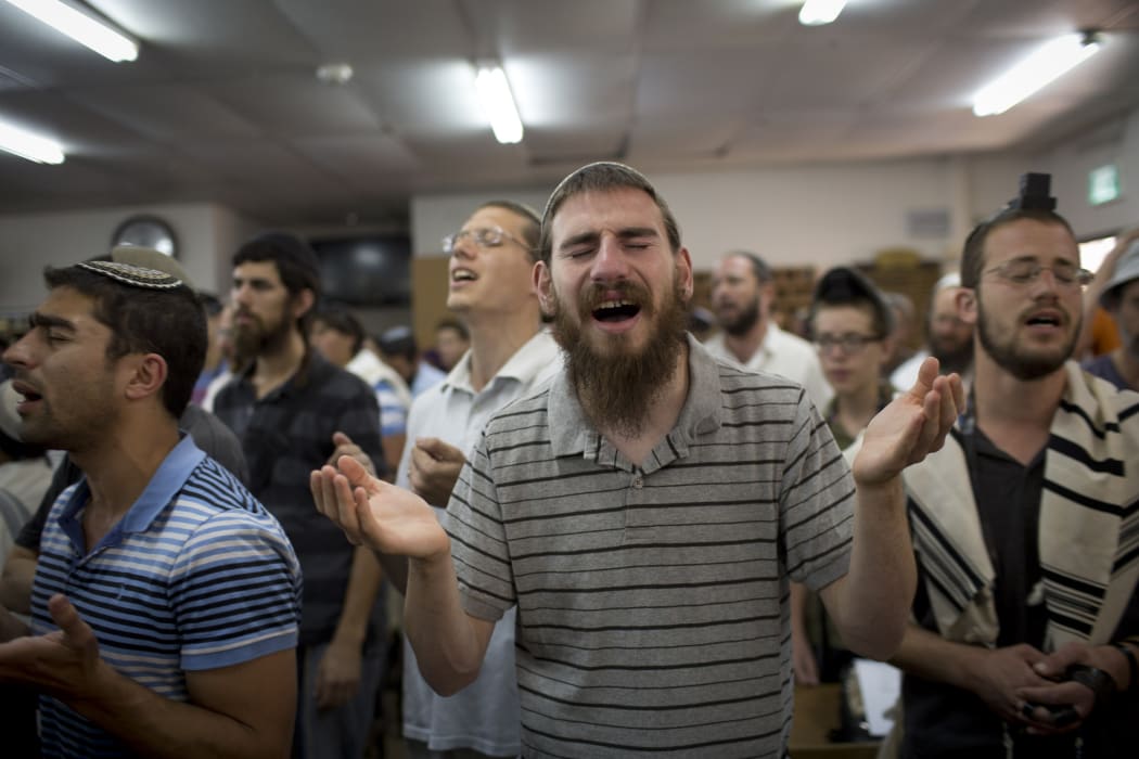 Jewish students in the settlement of Gush Etzion in the West Bank pray for the missing teenagers.