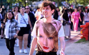 Fans of US singer Taylor Swift, also known as a Swifties, arrive at the Melbourne Cricket Ground (MCG) for the first of Swift's three shows in Melbourne on February 16, 2024. Swift is playing to 260,000 fans over three concerts in Melbourne starting February 16 as part of her Eras World Tour. (Photo by William WEST / AFP)