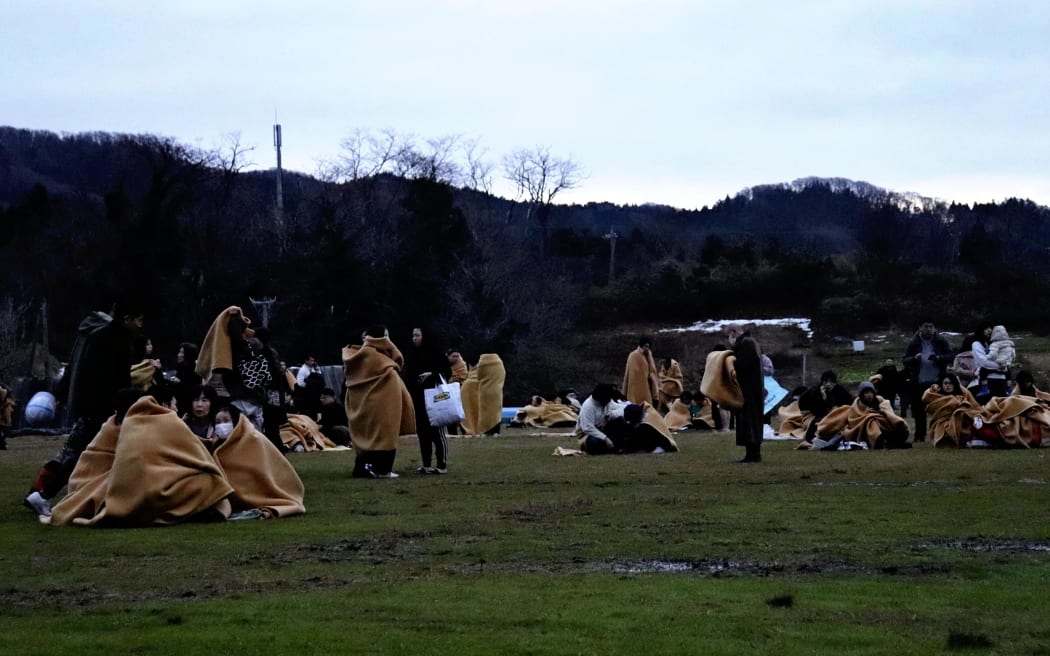 People seek safety outside in Wajima City following an earthquake on 1 January, 2024