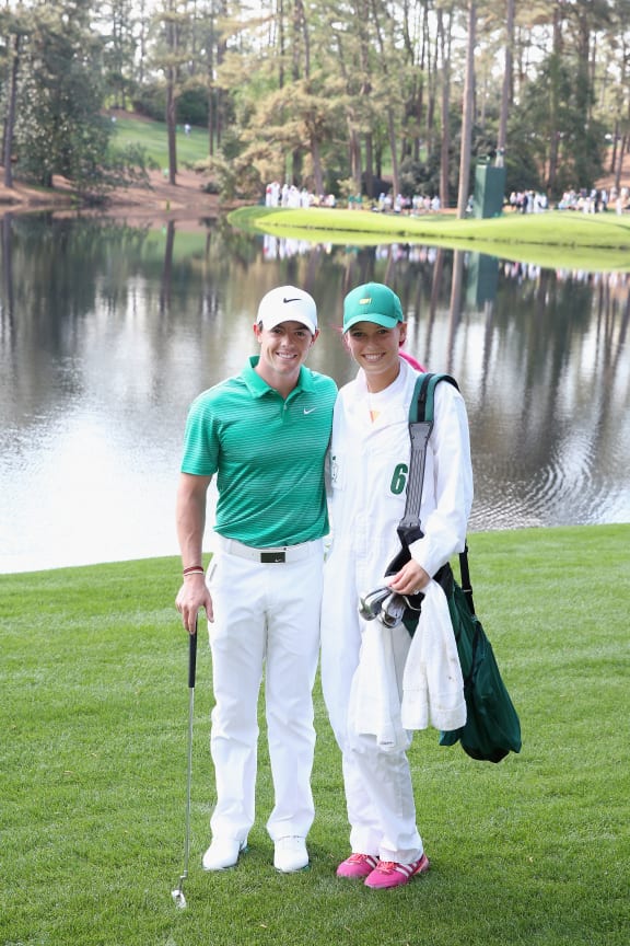 Rory McIlroy and Caroline Wozniacki at the start of the 2014 Masters tournament.