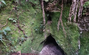 The entry to one of the ancient tunnel houses located during a survey of culturally important sites at Opepe