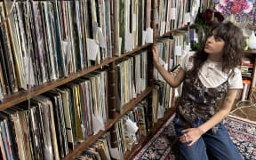 Jula with her dad's record collection.