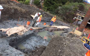The object that’s believed to be a partially complete waka is under wraps at the Ōkahu inlet on the Pūhoi to Warkworth motorway project.