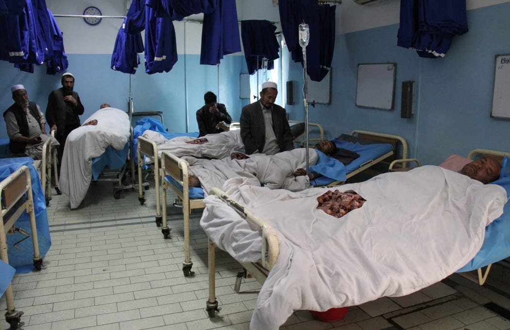 Those injured in the suicide bomb attack that targeted a voter registration center in Kabul, Afghanistan on April 22, 2018, are treated at a local hospital.