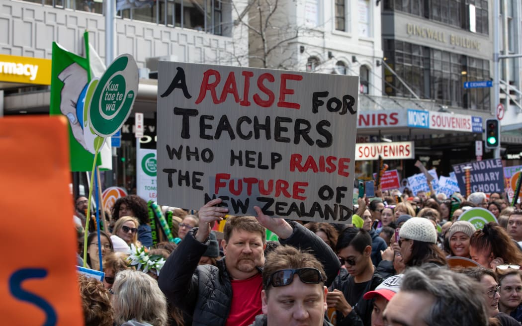 Families and children were out in force on Queen Street to support teachers on strike.