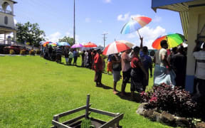 Voters outside a polling station in the Samoa 2021 general election