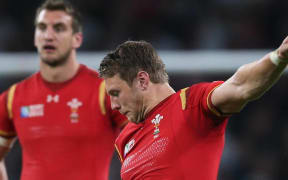 Wales’ first-five Dan Biggar kicks a penalty in the win over England.