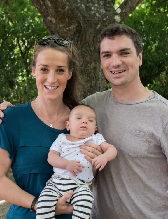 Lindy Jacomb, holding her baby son Bohdan, has been reunited with her brother, Braden Simmons, after more than a decade.