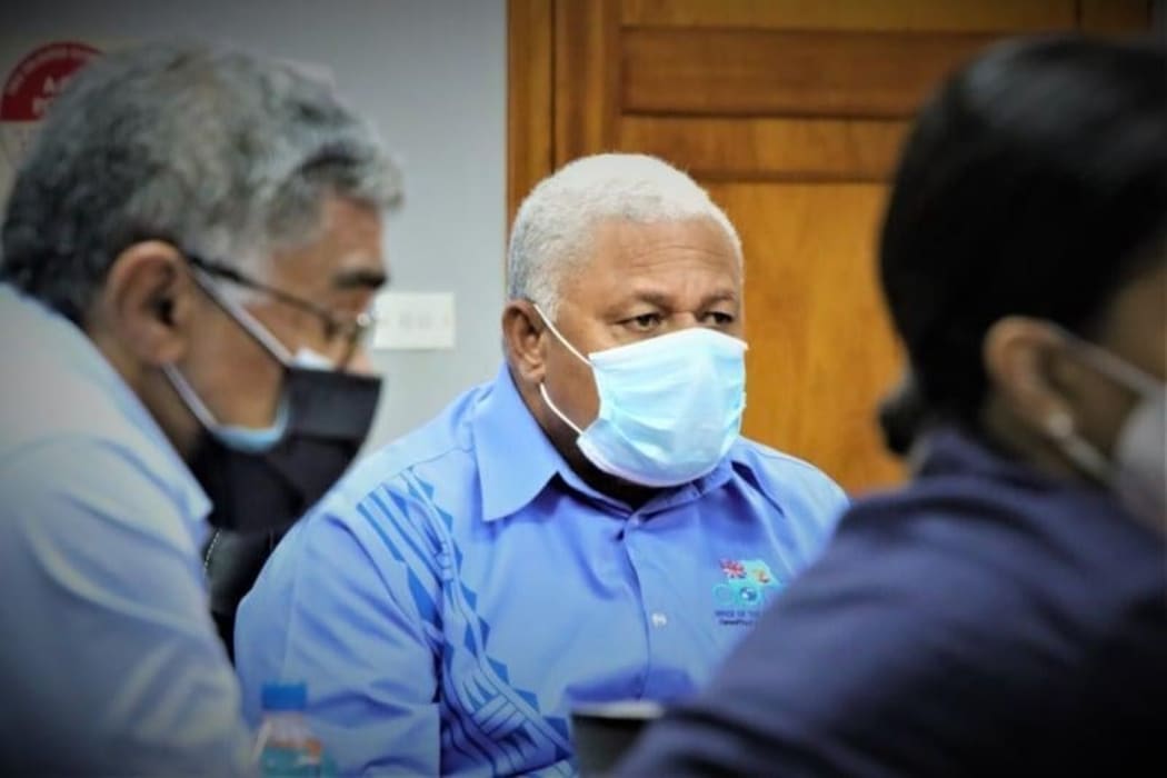 Dr James Fong and PM Frank Bainimarama.